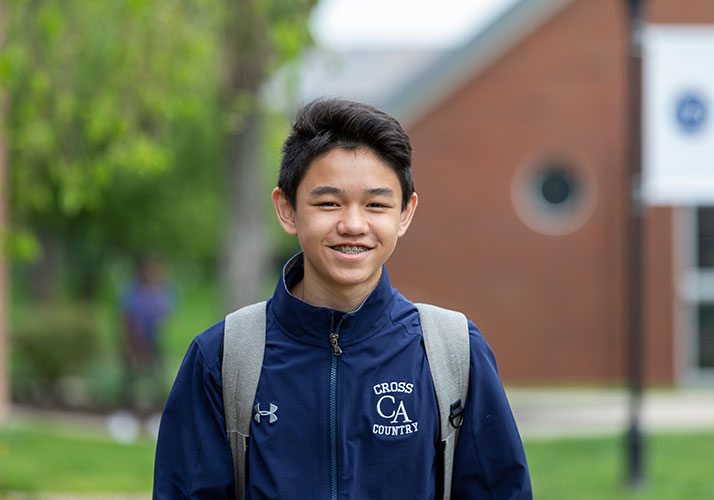 Photo of a happy student. Link to Gifts of Real Estate